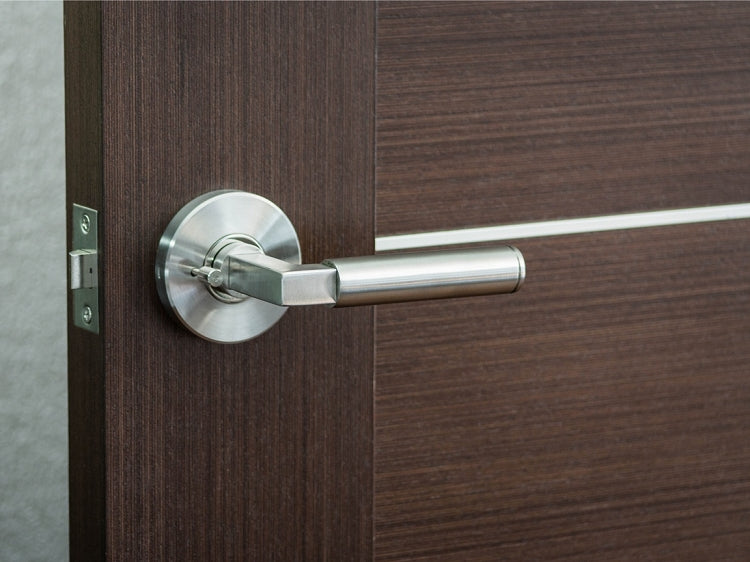 Nova Granata Modern Door Lever mounted on a door.