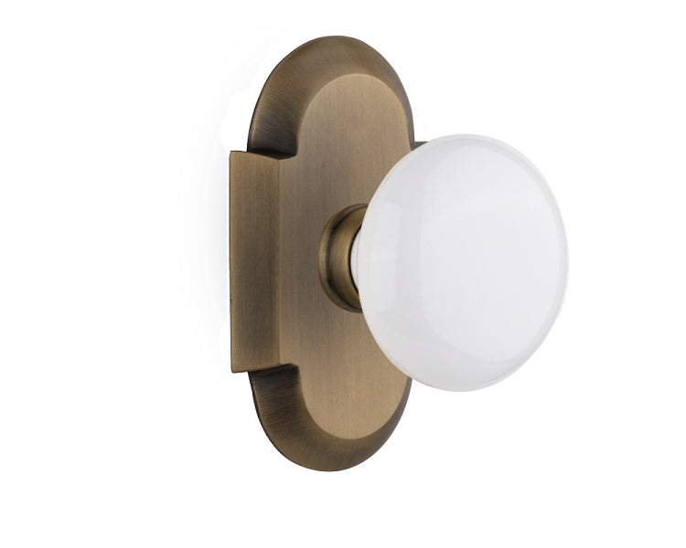 Nostalgic Warehouse Cottage Plate with White Porcelain Knob - Antique Brass