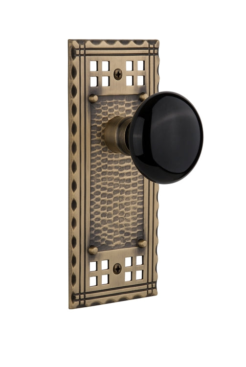 Nostalgic Warehouse Craftsman Plate with Black Porcelain Knob - Antique brass