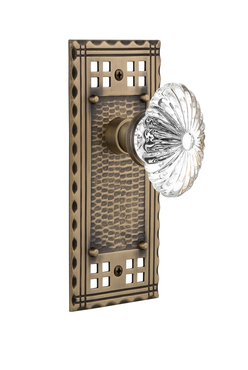Nostalgic Warehouse Craftsman Plate with Oval Fluted Crystal Knob - Antique Brass
