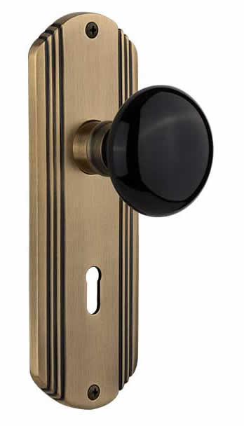 Nostalgic Warehouse Craftsman Plate with Black Porcelain Knob - Antique Brass