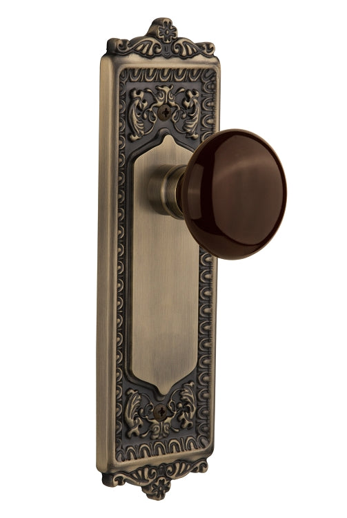 Nostalgic Warehouse Egg and Dart Plate with Brown Porcelain Knob - Antique Brass