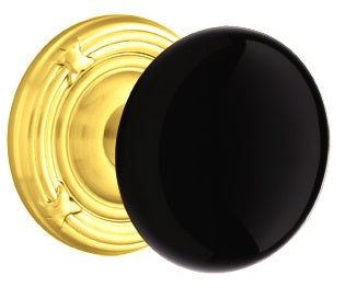 Emtek Ebony Porcelain Knob With Ribbon And Reed Rosette Polished Brass