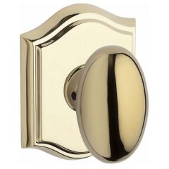 Baldwin Reserve Ellipse Knob With Arched Rosette In Polished Brass