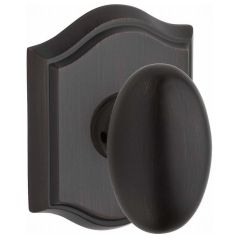 Baldwin Reserve Ellipse Knob With Arched Rosette In Venetian Bronze