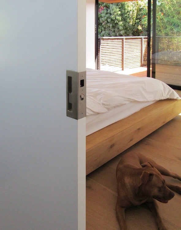 CL400C Keyed Pocket Door Lock In Use