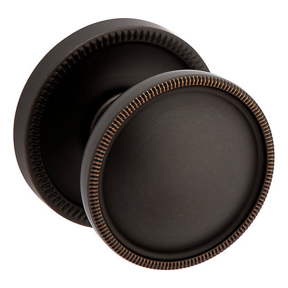 Baldwin Estate Series Coined Tulip K0013 Knob Set