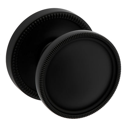 Baldwin Estate Series Coined Tulip K0013 Knob Set