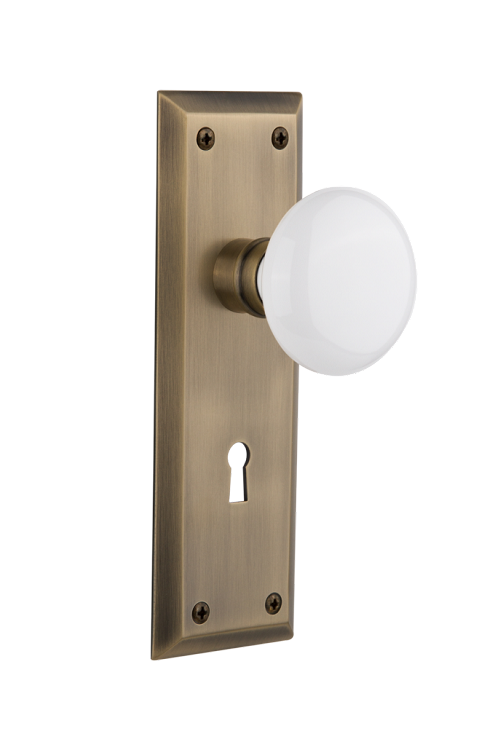 Nostalgic Warehouse New York Plate with Porcelain Knob - Antique Brass