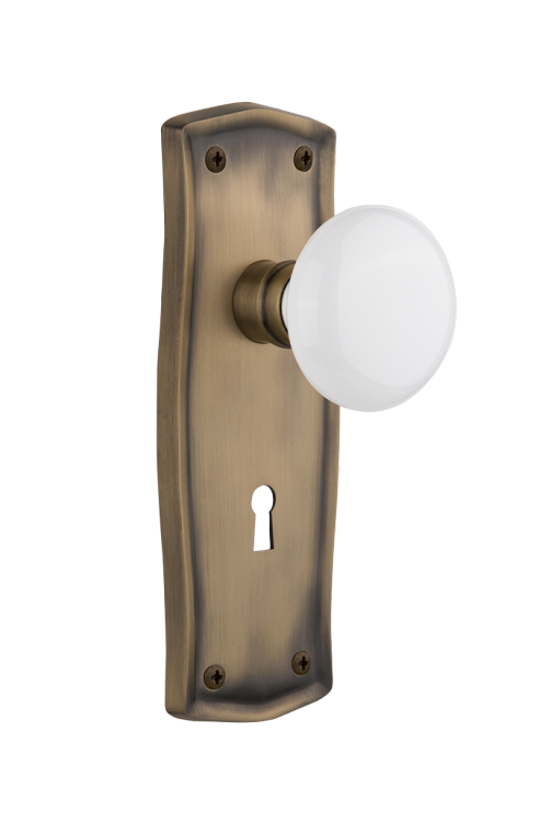 Nostalgic Warehouse Prairie Plate with White Porcelain Knob Mortise Lock- Antique Brass