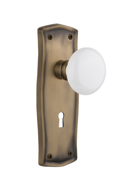 Nostalgic Warehouse Prairie Plate with White Porcelain Knob Mortise Lock- Antique Brass