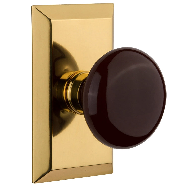 Nostalgic Warehouse Studio Plate with Brown Porcelain Knob - Polished brass