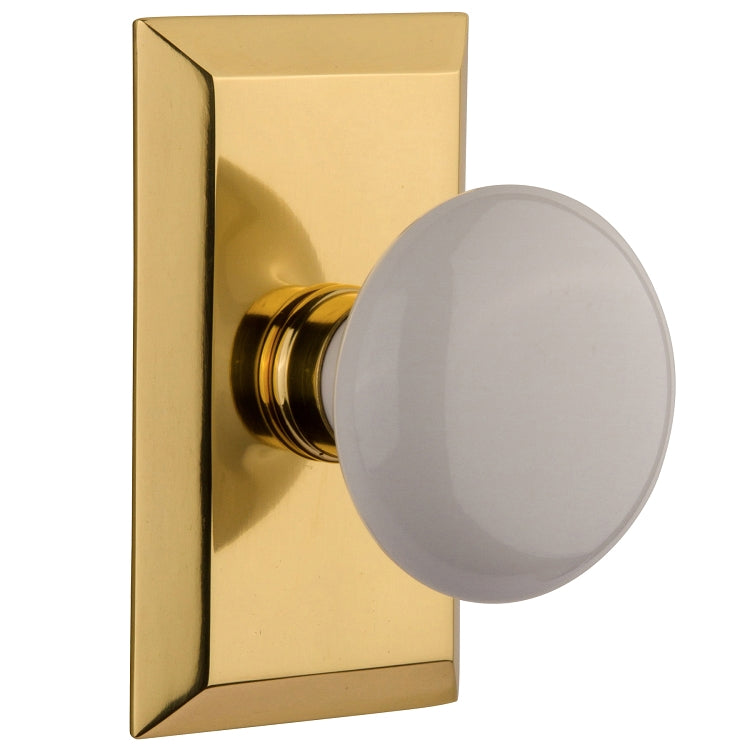 Nostalgic Warehouse Studio Plate with White Porcelain Knob - Polished brass