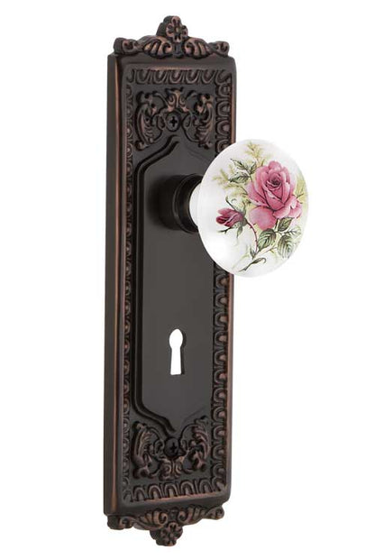 Nostalgic Warehouse Egg and Dart Plate with White/ Rose Porcelain Knob - Timeless Bronze