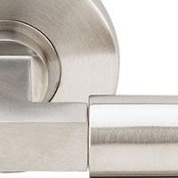 Inox 104 Brussels Lever Handle with Round Rosette