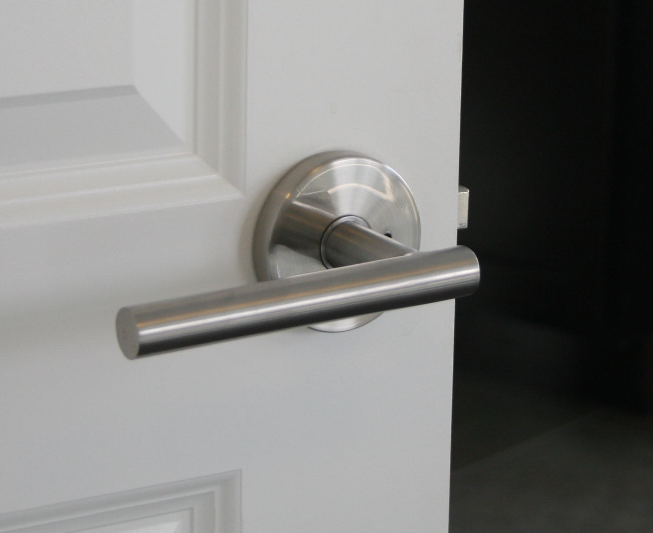 Sure-Loc Juneau Lever on Door - Satin Stainless
