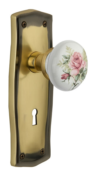 Nostalgic Warehouse Prairie Plate with White/Rose Porcelain Knob - Antique Brass