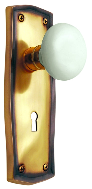 Nostalgic Warehouse Prairie Plate with White Porcelain Knob - Antique Brass