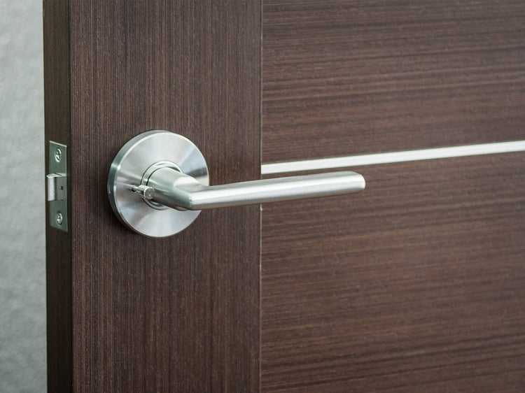 Nova Simplicity Lever mounted on a door