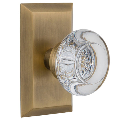 Nostalgic Warehouse Round Clear Crystal Knob with Studio Plate - Antique brass