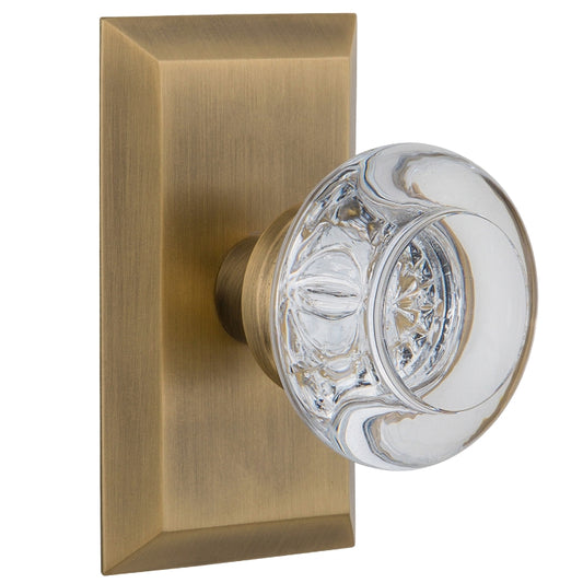 Nostalgic Warehouse Round Clear Crystal Knob with Studio Plate - Antique brass